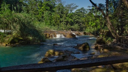 Agua Azul Waterfalls in Chiapas, Mexico — vibrant turquoise cascades flowing through lush jungle, a natural wonder of southern Mexico.