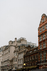 Fototapeta premium Historic Building Facades on Overcast Day – London, United Kingdom