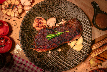 The Picanha Steak on Black plate for food concept.