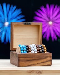 Assortment of Beaded Bracelets in Wooden Box Against Fireworks