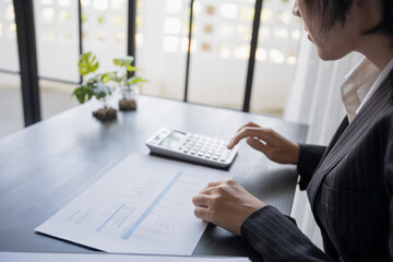 business man Auditor or internal revenue service staff checking annual financial statements company...