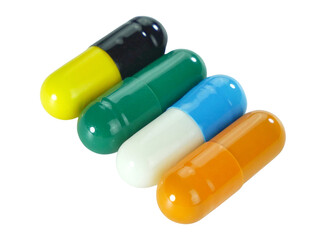 Bulk multi-colored capsule pills isolated on white background.