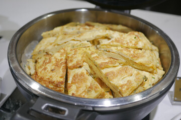 Delicious tortilla ready to serve at a breakfast buffet