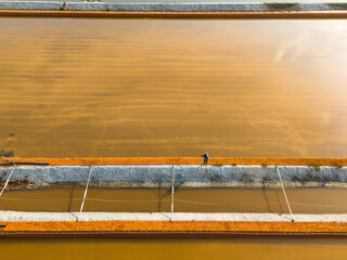 Salt-farm workers produce salt in the salt fields， salt-farm equipment produces salt