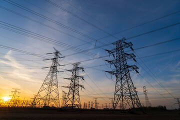 The pylons are in the evening, Substation in the evening, High voltage substation and beautiful sunset glow
