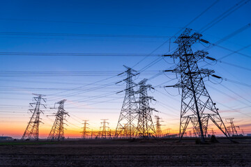The pylons are in the evening, Substation in the evening, High voltage substation and beautiful sunset glow
