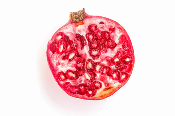 a piece of pomegranate isolated on a white background