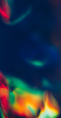 Light blur leak. Film burn. Gradient defocused beam glowing on dark background. Spectrum ray color...