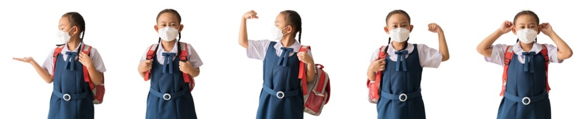 PNG, Set of Asian little girls wearing Thai school uniform Wear a mask to protect yourself from germs, Standing posing carrying a bag and hands holding books, Isolated on white background