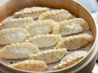 Dumplings in a bamboo steamer