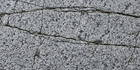 Obraz premium Cracked Asphalt Texture, Damaged Pavement Surface, Weathered Road Background, Urban Decay Detail, Grungy Concrete Pattern, Broken Street Material
