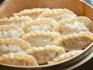 Dumplings in a bamboo steamer