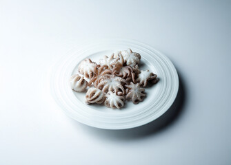 Boiled webfoot octopus on a plate