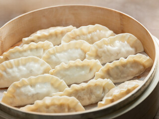 Dumplings in a bamboo steamer