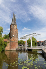 The historic Oostpoort of Delft, a picturesque medieval city gate with its elegant spires and a...
