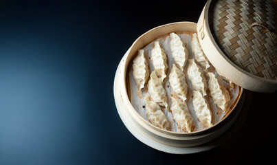 Dumplings in a bamboo steamer