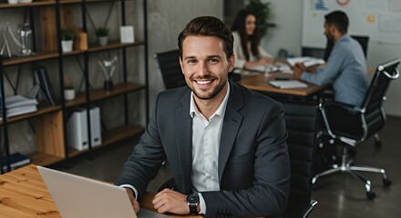 Smiling man in suit at office