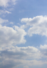 Blue sky with puffy clouds