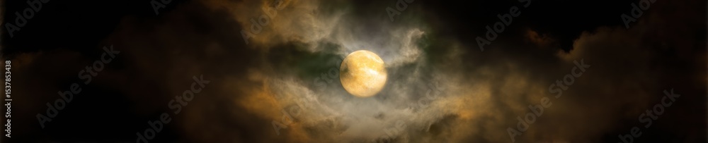 Aufkleber dramatic moonrise with full moon partially hidden by dense clouds in night sky - atmospheric mystery