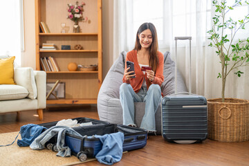 Portrait of woman use technology of smartphone for hotel and resort booking online summer holiday...