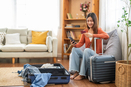 Portrait of woman use technology of smartphone for hotel and resort booking online summer holiday travel system planning searching information weekend vacation trip.reservation online travel