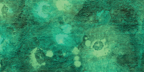 Abstract textured background in shades of green and teal featuring rough surface and organic watercolor style design for decorative purposes
