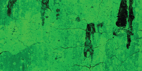 Obraz premium Textured green background showing cracks and imperfections suitable for artistic designs and graphic elements with abstract grunge aesthetic