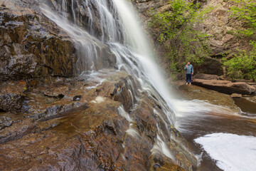 Gadelsha waterfall is the largest waterfall in the Southern Urals on a summer sunny day