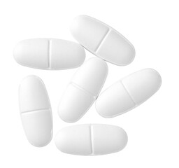 White oval pills isolated on white background, top view.