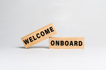 welcome onboard word text on wooden blocks isolated on white background