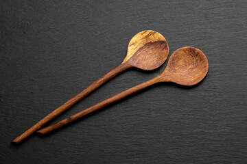 Wooden Cooking Spoons on Slate Background – Rustic Kitchen Utensils