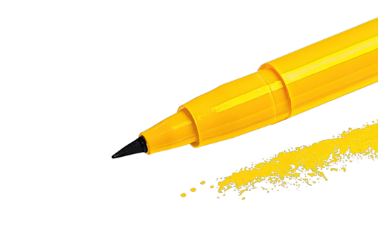 Close-up of bright yellow marker tip with ink splatter