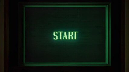 Green Digital Display Showing Abstract Data Stream With Pixelated Text START