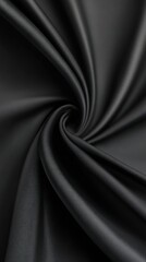 Obraz premium Elegant black fabric showcasing intricate swirling texture in a close-up view