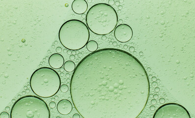 Macro microscope green bubble texture, Close-up Green bubbles and drops oil background . blue green...