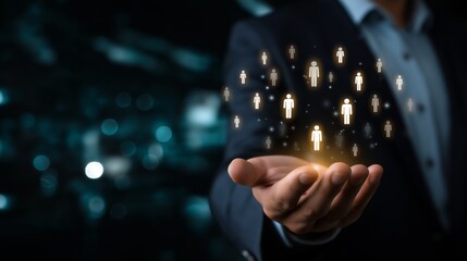 businessman hand holding human icon Recruitment and candidate selection process concept