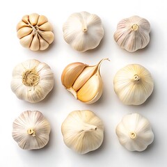Fototapeta premium Eight garlic bulbs arranged on white background isolated on white background