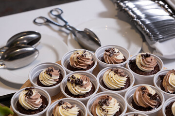 chocolate cupcakes on wooden plate in wedding party reception