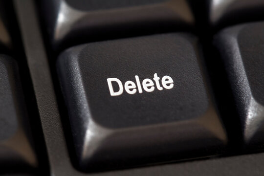 close up of the delete key on a computer keyboard