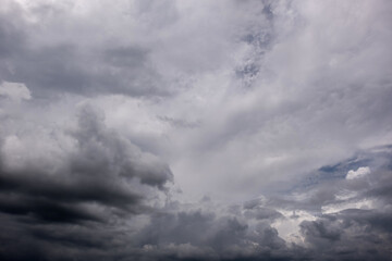 Obraz premium Dark sky with stormy clouds. Dramatic sky rain,Dark clouds before a thunder-storm,clouds before rain