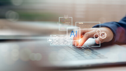 Hand interacting with virtual AI assistant on laptop keyboard. Concept of artificial intelligence in data analysis, automation, machine learning, and digital transformation.
