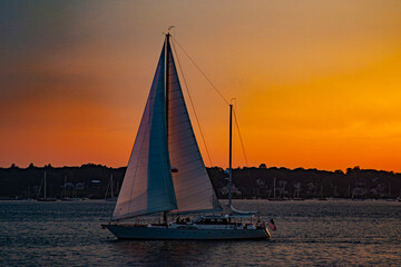 Sailboat and orange sunset