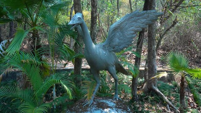 A Beautiful Moment with an Ostrich statue
