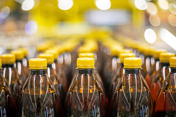 drinks, beer and water in plastic bottles in the supermarket