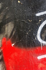 Bold abstract graffiti texture in black, red with white accents. 90s urban style, grunge,...