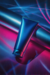 Naklejka premium Realistic sunscreen tube vibrant blue color, illuminated by colorful neon lights, creating striking visual effect. product is positioned against sleek metallic background, evoking modern
