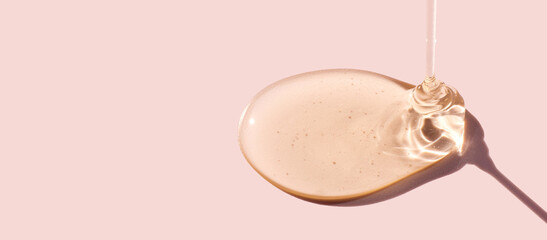drop gel serum on pastel background
