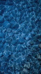 Obraz premium Clear Blue Water Over Rocks