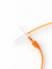 Part of orange intravenous cannula 14 G on white background, external diameter 2,1 mm, used in trauma, blood transfusion, surgery, ascites puncture.