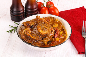 Italian cuisine - ossobuco with sauce